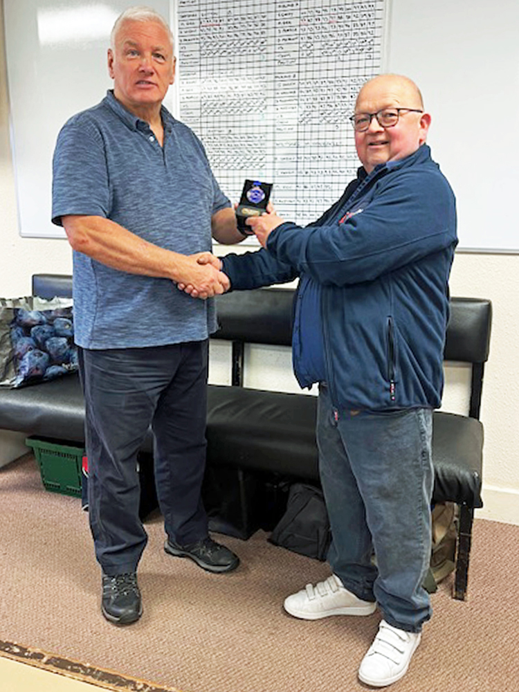 Photograph shows Dave Stocks of Sutton Coldfield RPC (pictured right) receiving his SSRA Individual Air Pistol League - Winter 2025/2026 - 3rd Place Medal from from Sutton Coldfield RPC Secretary - Jeff Hough (pictured left).