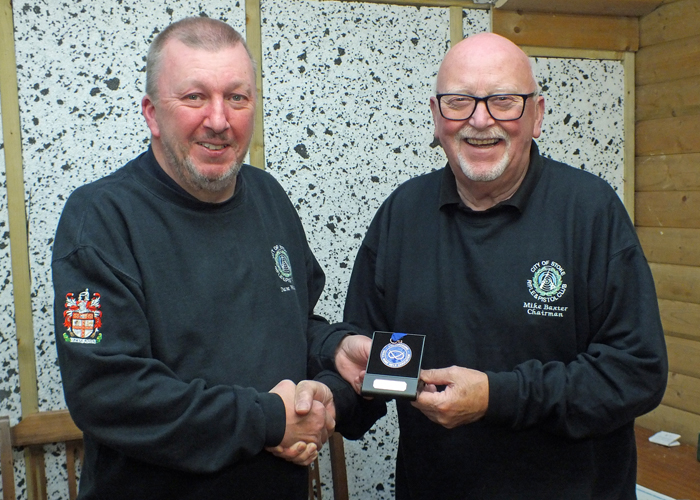 Photograph shows City of Stoke RPC Chairman - Mike Baxter (pictured right) presenting David Walker (pictured left) with his SSRA Individual 10 Metres Air Rifle 'A' League 3rd Place Medal.