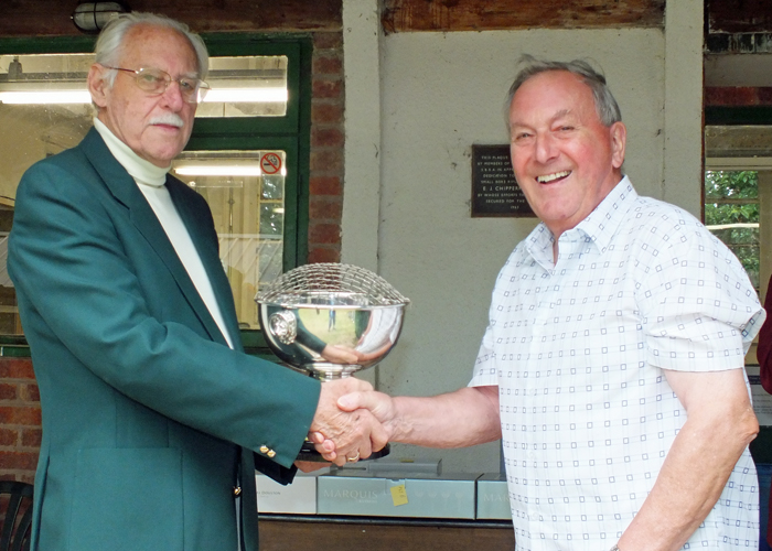 Photograph shows SSRA President - Major (Retired) Peter Martin MBE, pictured left - presenting the K. Madeley Rose Bowl to M.B.P. Willcox, pictured right.