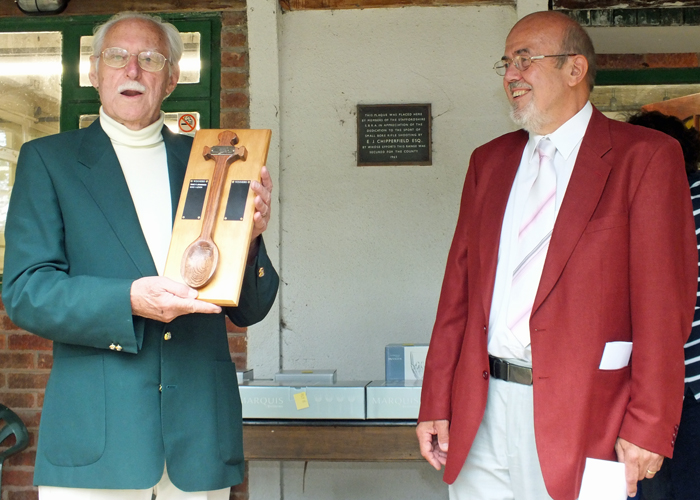 Photograph shows SSRA President - Major (Retired) Peter Martin MBE, pictured left - receiving the Wooden Spoon from Richard Tilstone, pictured right.