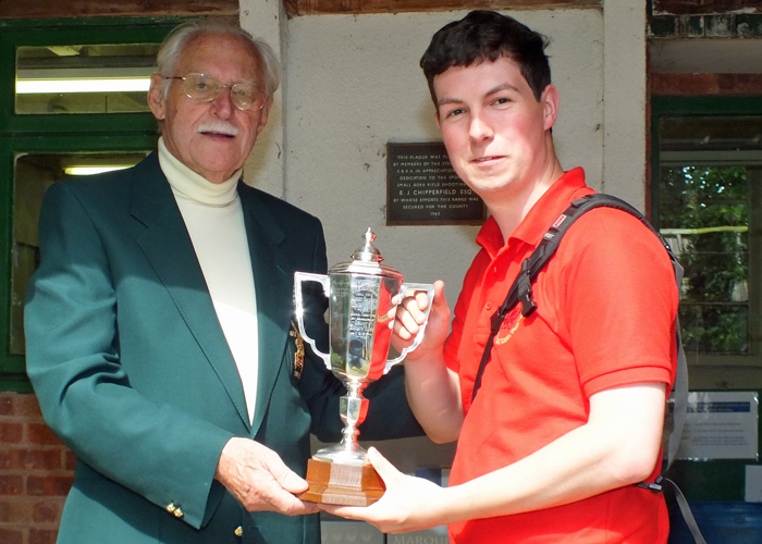 Photograph shows SSRA President - Major (Retired) Peter Martin MBE, pictured left - presenting the Greatrex Cup to R. Hemingway, pictured right.