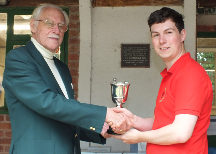 Photograph shows SSRA President - Major (Retired) Peter Martin MBE, pictured left - presenting the Association Cup to R. Hemingway, pictured right.