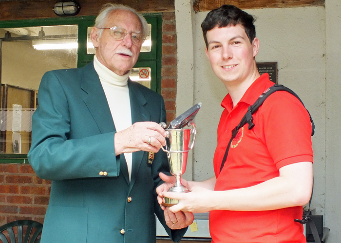 Photograph shows SSRA President - Major (Retired) Peter Martin MBE, pictured left - presenting the Miniature Rifle Cup and First Place Medal to R. Hemingway, pictured right.