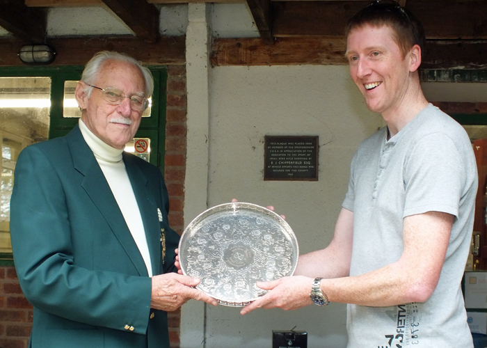 Photograph shows S. Green (pictured right) receiving the 'Come Day - Go Day' Salver from SSRA President, Major (Retired) Peter Martin, MBE (pictured left)
