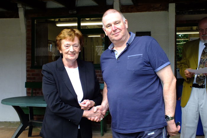 Photograph shows Mary Jennings, pictured left, presenting the Staffordshire Class 'C' Aggregate 2nd Place Medal to Ivor Leigh, pictured right.