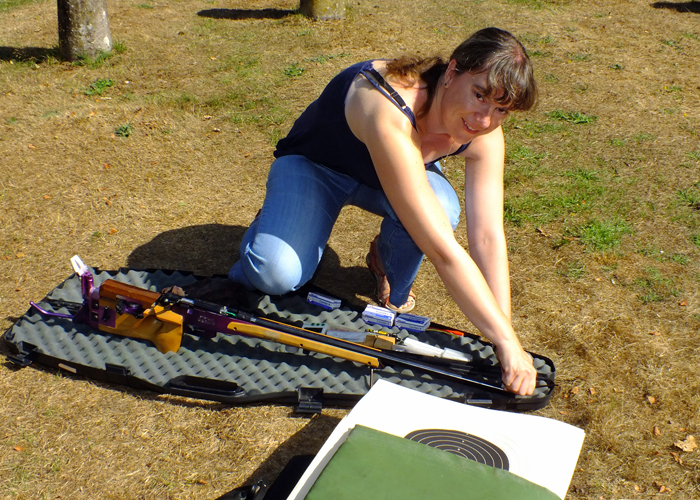 Photograph shows another competitor getting on nicely with her attention to detail prior to shooting.