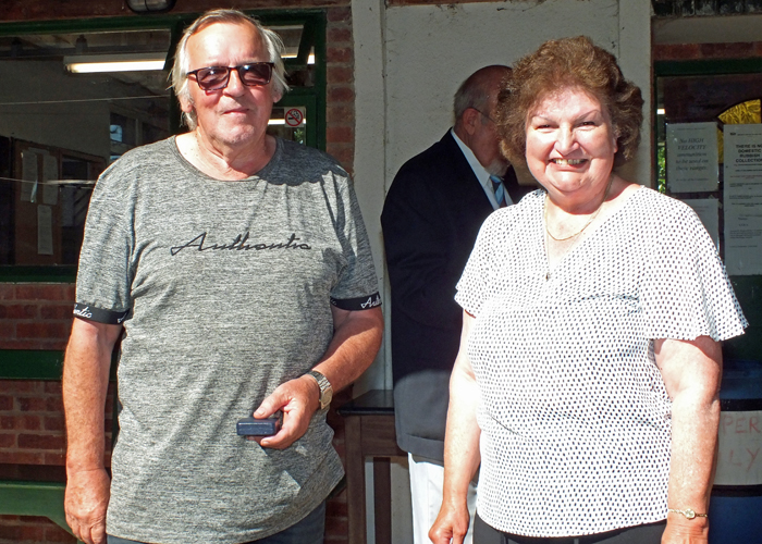 Photograph shows Mrs. Janet Troke (pictured right), presenting the NSRA Silver Medal to Ian Abbotts (pictured left).