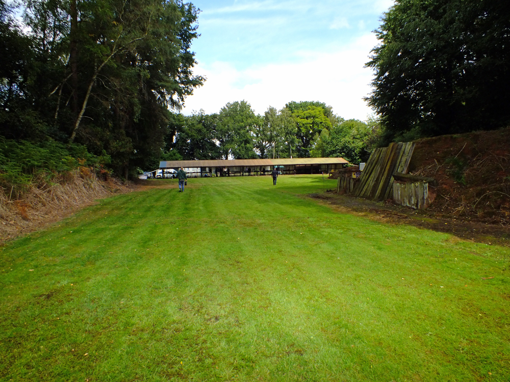 Photograph shows the view from the end of the 100 yards range, looking back towards the firing line.