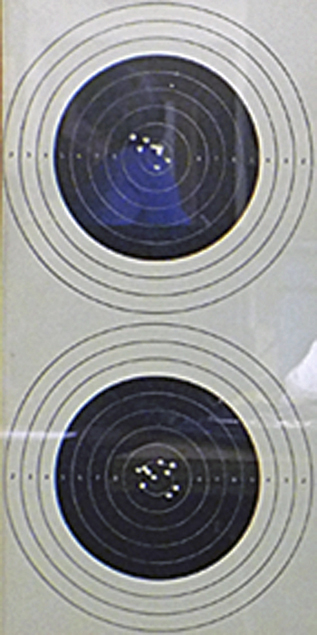 Photograph show in detail the superb accuracy of Peter's shooting on each target.