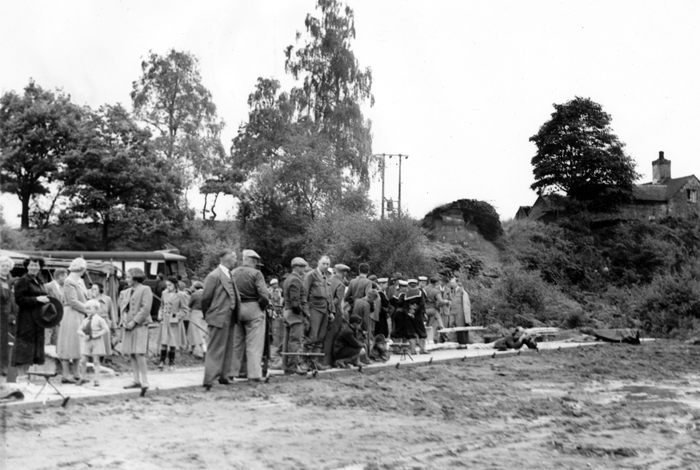 Photograph shows representatives of the armed forces (cadets maybe) and various dignitaries at a competition held at the Chipperfield Ranges.