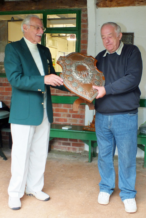 Photograph shows D. Bayley (pictured right) receiving the Association Shield on behalf of City of Birmingham from SSRA President, Major (Retired) Peter Martin, MBE (pictured left).