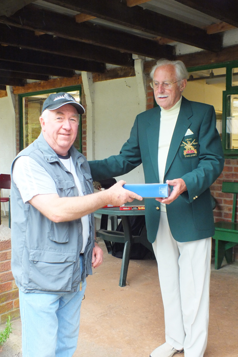 Photograph shows F. Dukes (pictured left) receiving the Class 'D' Third Place Prize from SSRA President, Major (Retired) Peter Martin, MBE (pictured right).