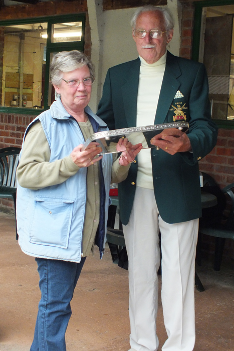 Photograph shows M. Bayley, pictured left, receiving The James Beattie Tray from SSRA President - Major (Retired) Peter Martin, MBE.