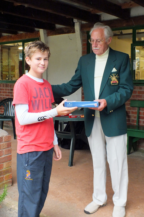 Photograph shows M. Bruce (pictured left) receiving the Class 'D' Second Place Prize from SSRA President, Major (Retired) Peter Martin, MBE (pictured right).