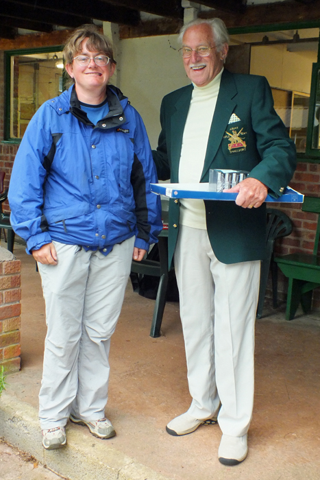 Photograph shows Ms L. Asquith (pictured left) receiving the Class 'C' First Place Prize from SSRA President, Major (Retired) Peter Martin, MBE (pictured right).