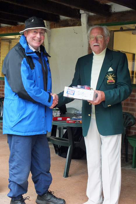 Photograph shows N. Peters (pictured left) receiving the Staffordshire Open 'Top Veteran' Prize from SSRA President, Major (Retired) Peter Martin, MBE (pictured right).