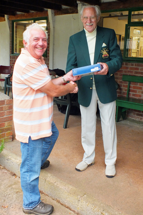 Photograph shows W. Davis (pictured left) receiving the Class 'B' Third Place Prize from SSRA President, Major (Retired) Peter Martin, MBE (pictured right).