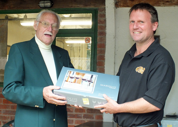 Photograph shows A. Burgess (pictured right) receiving the Class 'B' First Place Prize from SSRA President, Major (Retired) Peter Martin, MBE (pictured left)