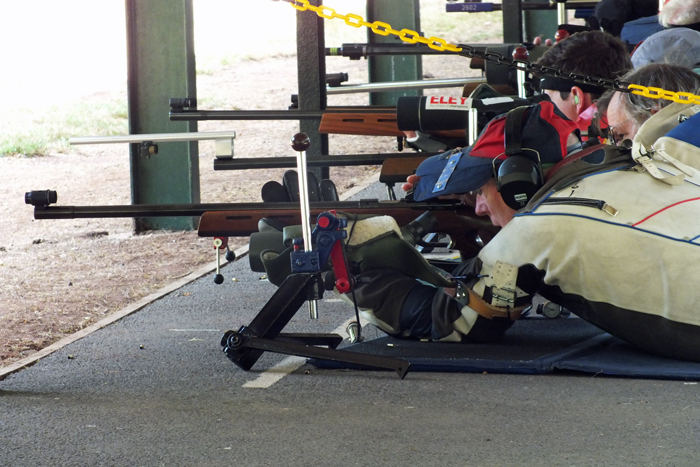 Photograph shows competitors in full concentration as their detail commences.