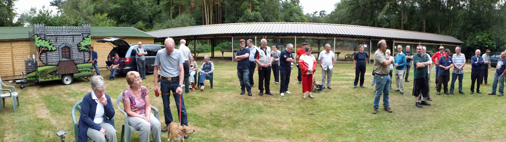 Photograph shows competitors eagerly awaiting the results of their hard work as the presentations are about to get underway.