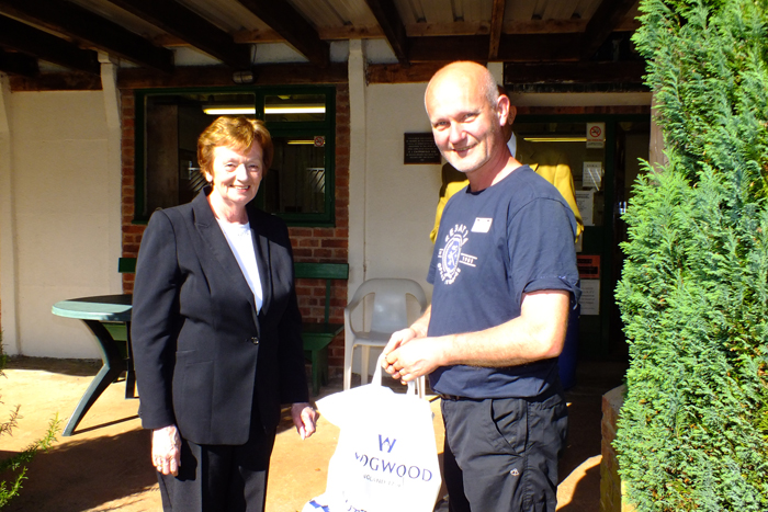 Photograph shows Mary Jennings, pictured left, presenting the Class D 2nd Place Prize to Paul Watkiss, pictured right.