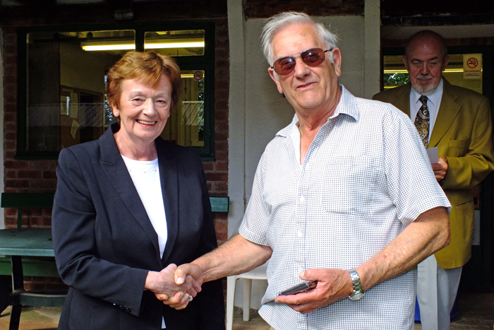 Photograph shows Mary Jennings, pictured left, presenting the Staffordshire Class 'A' Aggregate 3rd Place Medal to John Kemp, pictured right.