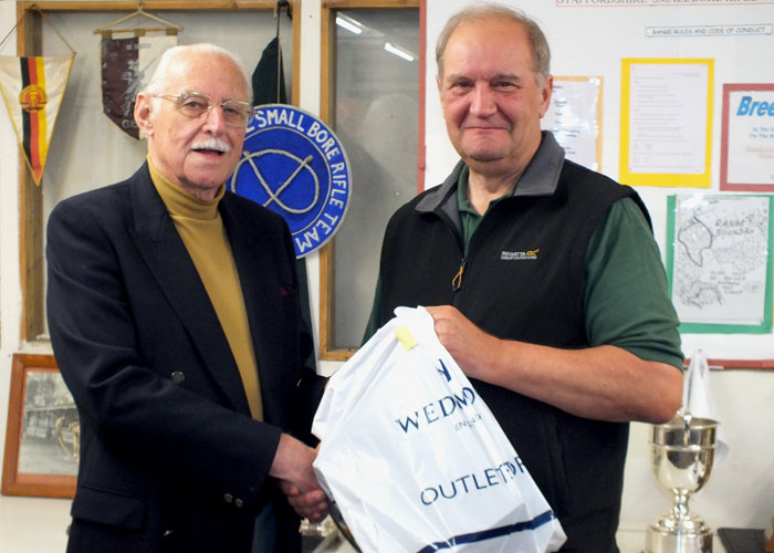 Photograph shows SSRA President - Major (Retired) Peter Martin MBE, pictured left - presenting the Staffordshire Open - Top Veteran Prize to Bob Heath, pictured right.