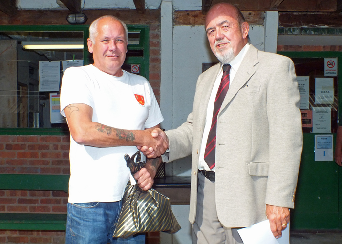 Photograph shows Graham Delaney (pictured left) receiving the Class 'D' 3rd Place Open Prize 2019 from SSRA Chairman - Richard Tilstone (pictured right).