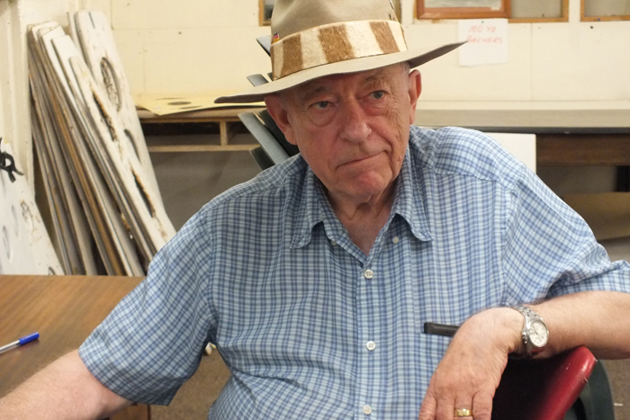 Photograph shows Dave Bayley having a quiet moment after setting up the trophies - well done on the getting the trophies immaculately cleaned for the occasion too.