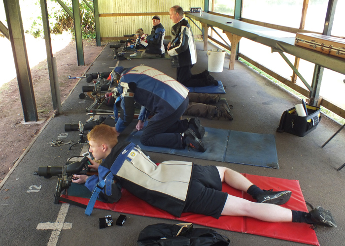 Photograph shows more competitors readying themselves for the start of the next detail.