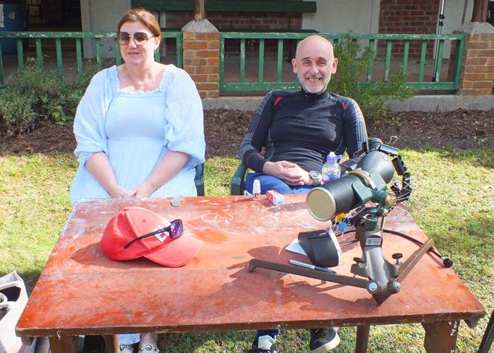 Photograph shows Gavin Scott-Brooker (pictured right) relaxing in the company of Mrs. Scott-Brooker (pictured left) before the next detail commences. 