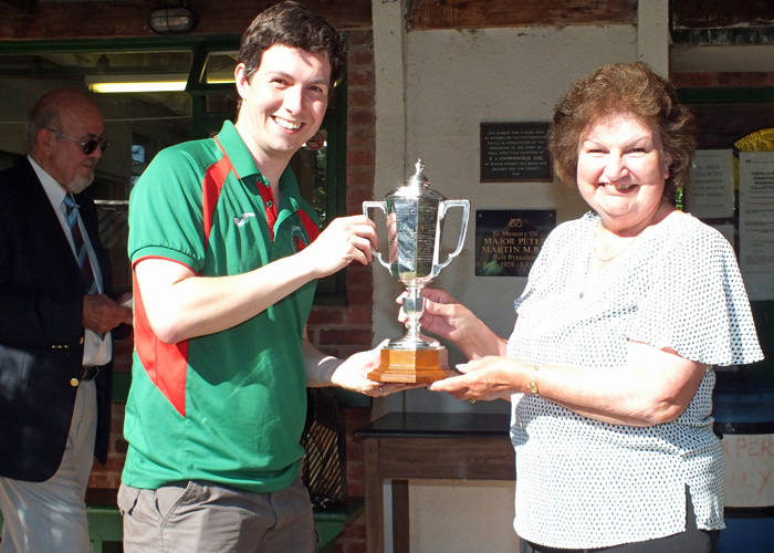 Photograph shows Mrs. Janet Troke (pictured right), presenting the Albert Greatrex Cup to Richard Hemingway (pictured left).