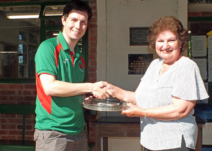 Photograph shows Richard Hemingway (pictured left) receiving the 'Come Day - Go Day' Salver from Mrs. Janet Troke (pictured right).