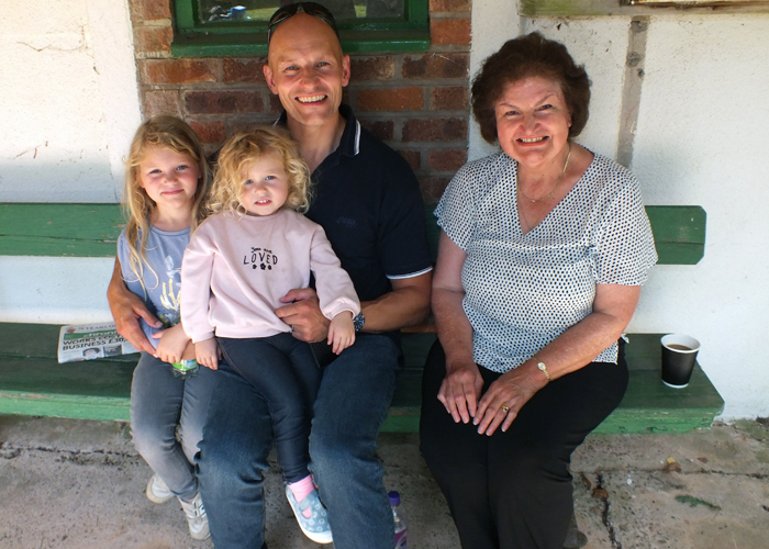 Photograph shows Martin Troke (pictured left with his young children) and Martin's mother - Janet Troke (pictured right).