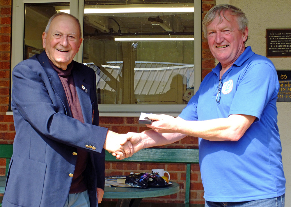 Photograph shows SSRA President - Mike B.P. Willcox (pictured left), presenting the NSRA County Silver Medal for 2025 to Alan Boyles (pictured right).