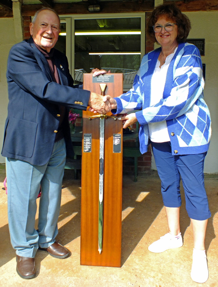 Photograph shows SSRA President - Mike B.P. Willcox (pictured left), presenting the Wilkinson Sword for 2025 to SSRA Treasurer - Judith Simcock (pictured right).