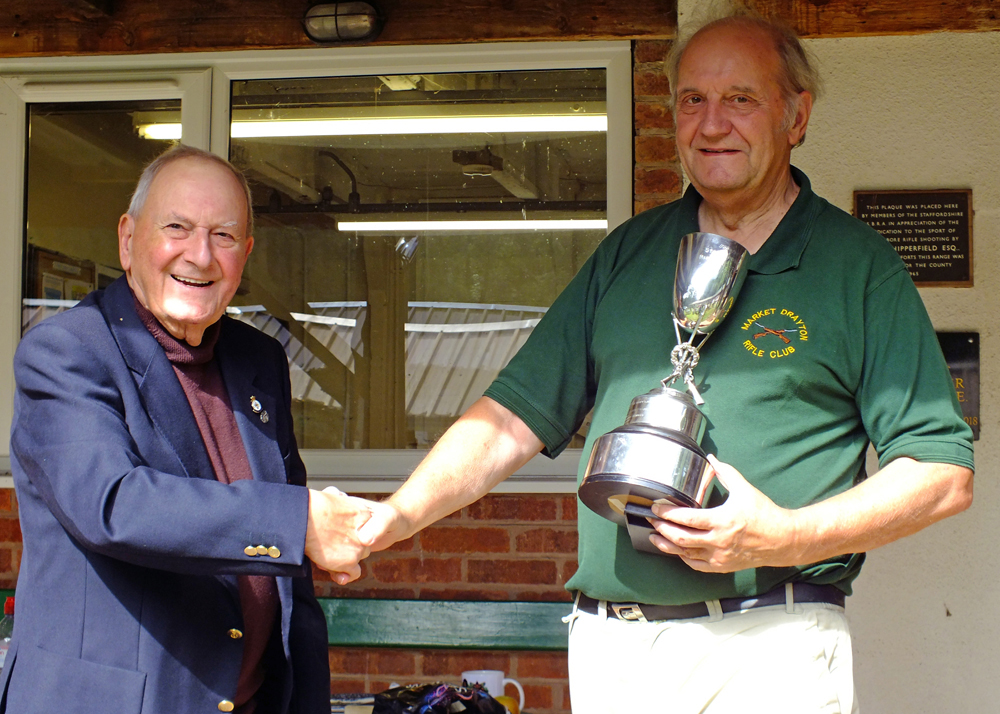 Photograph shows SSRA President - Mike B.P. Willcox (pictured left), presenting the Swynnerton Cup for 2025 to Bob Heath (pictured right).  Bob received the award on behalf of Steve Rowe.