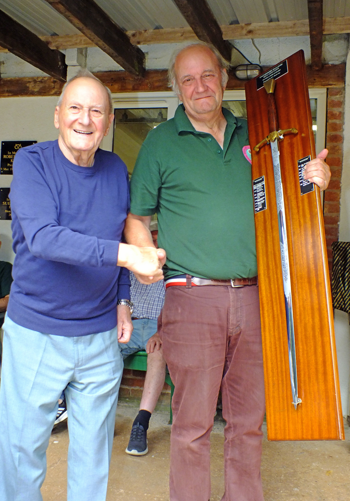 Photograph shows SSRA President - Mike B.P. Willcox (pictured left), presenting the Wilkinson Sword for 2026 to Bob Heath (pictured right).