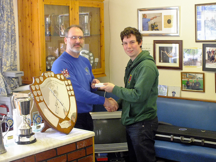 Photograph shows Richard Hemingway (pictured, right) receiving his trophy from Martyn Blezard (pictured, left.)